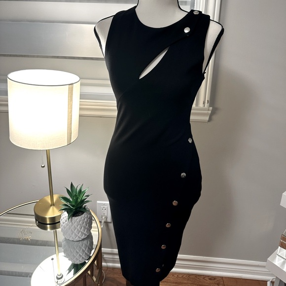 Stretchy fitted dress with metallic snap buttons - Picture 1 of 1
